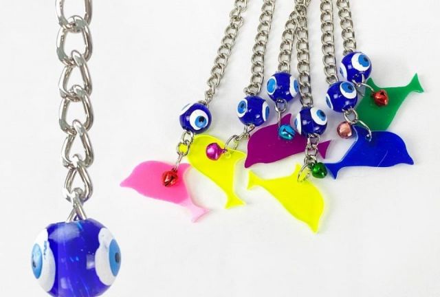 Juguete para pajaros forma de DELFIN de plastico